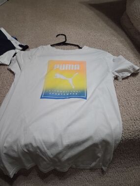 Puma White Tee with Yellow-Orange-Blue Gradient Logo